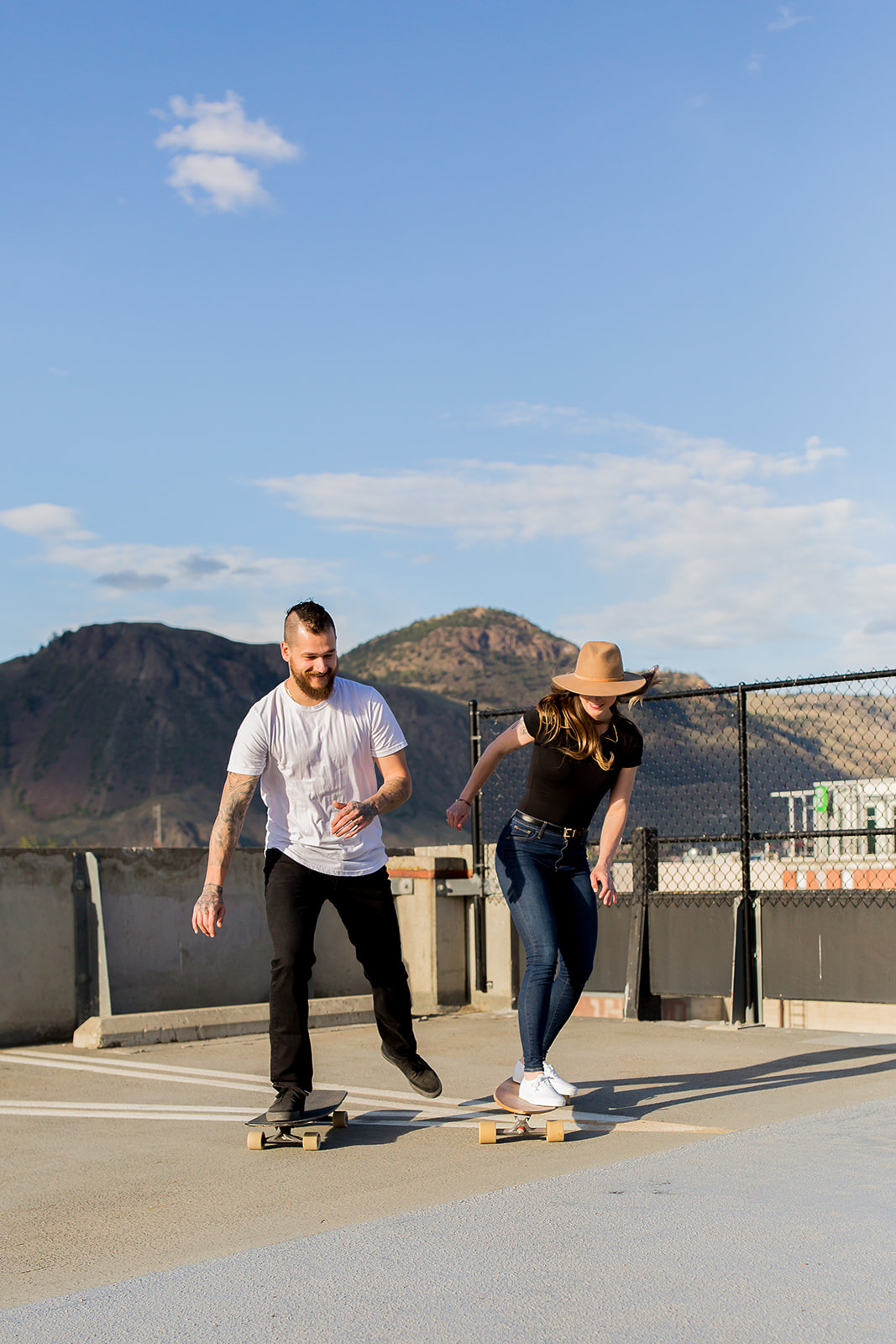 couple hangs out at a parkade for a cute couple's photoshoot in BC