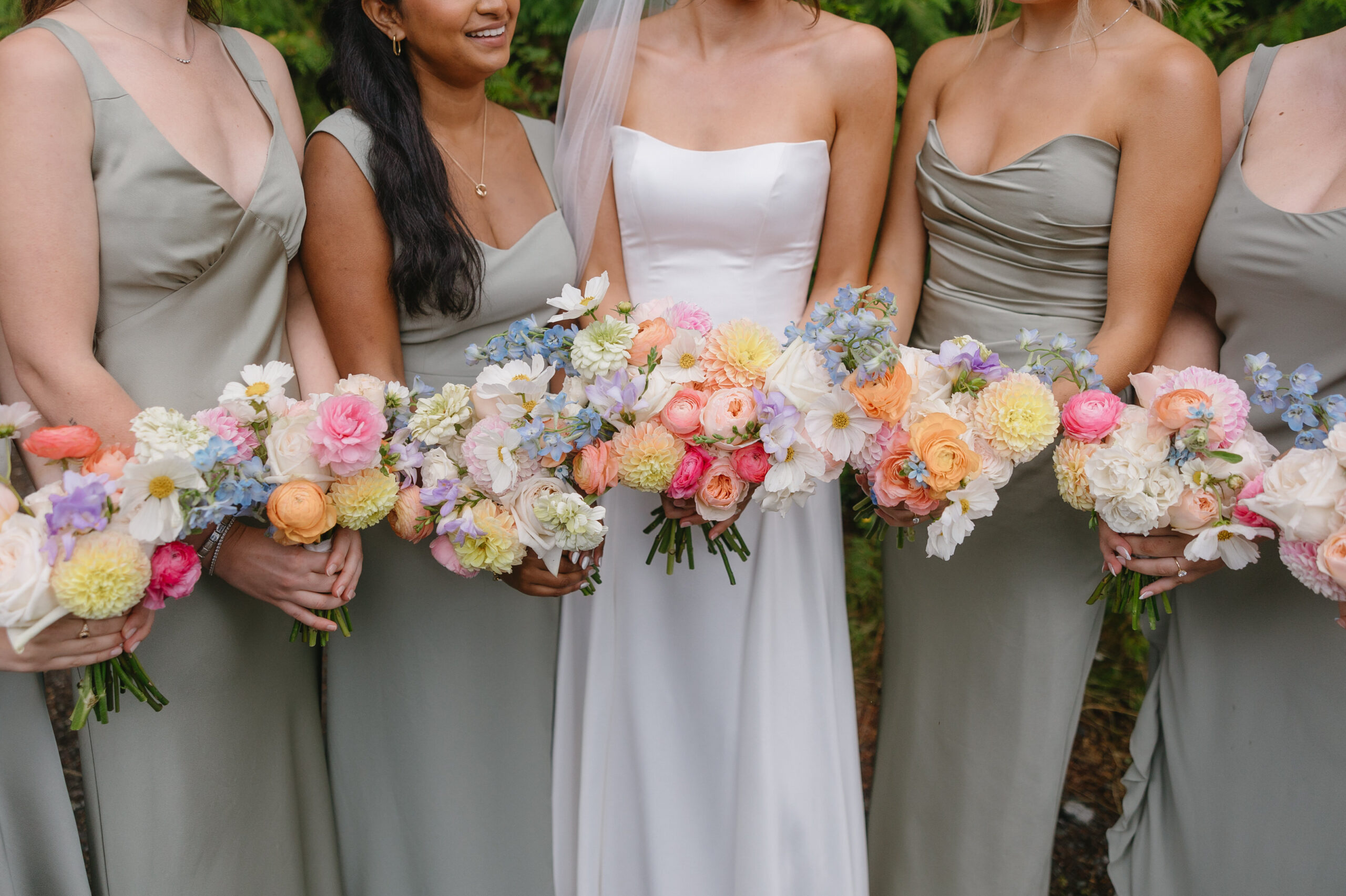 bridesmaids holding florals at whistler wedding