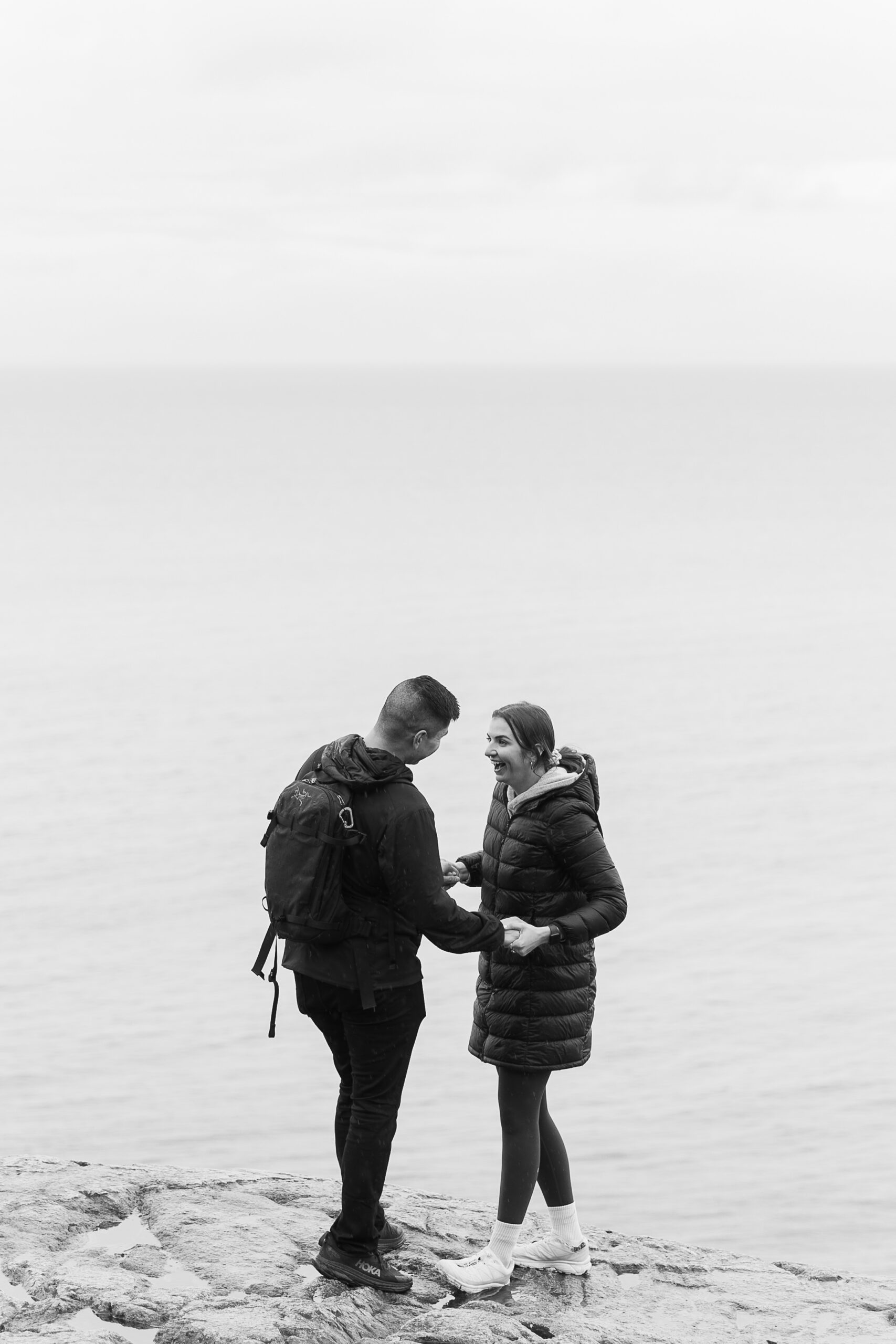girl surprised that she is getting proposed to at lighthouse park vancouver