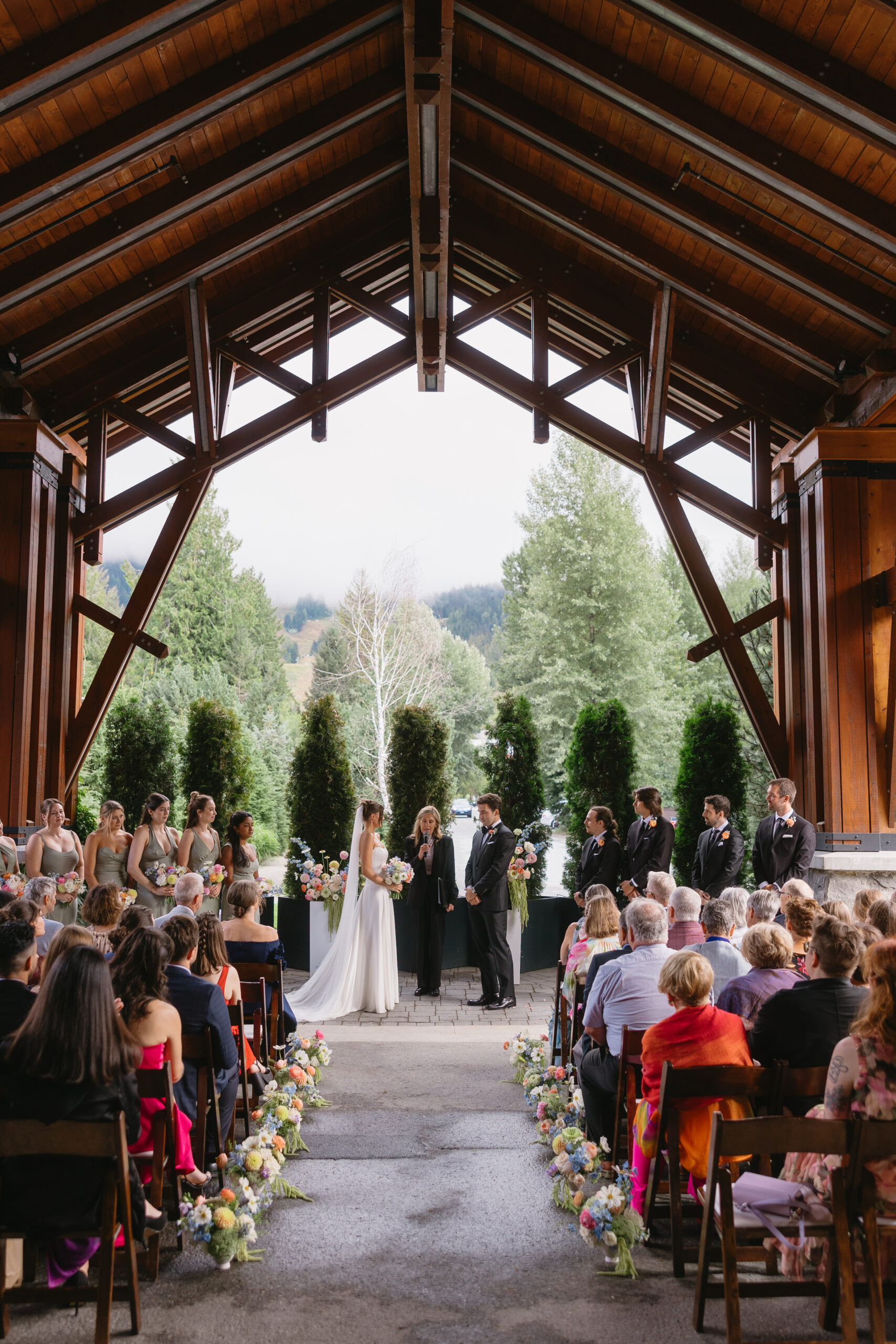 bride and groom standing at ceremony at nita lake lodge in whistler